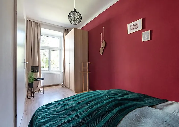 Colorful Apartment Facing Green Courtyard